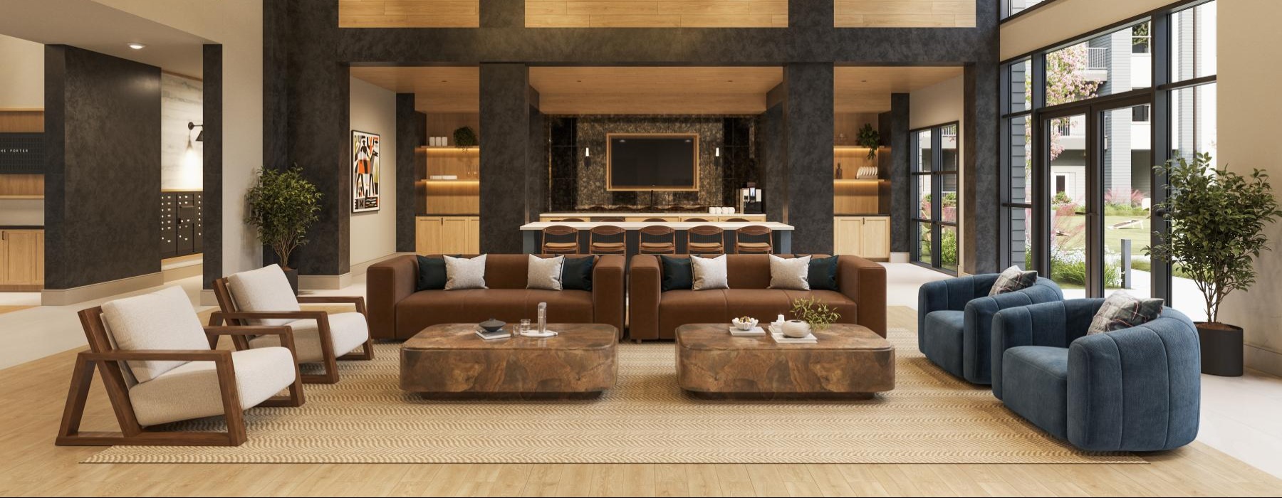 a large room with a sitting area and tall windows