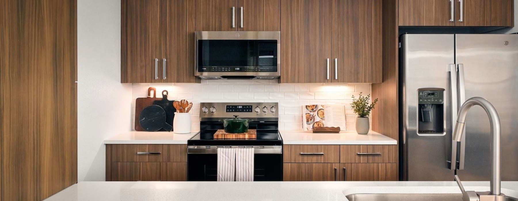 kitchen with stainless steel appliances and ample storage