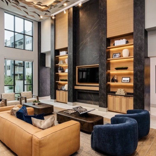 two story room with seating and a tv