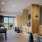 a game room with a wood floor and shuffleboard