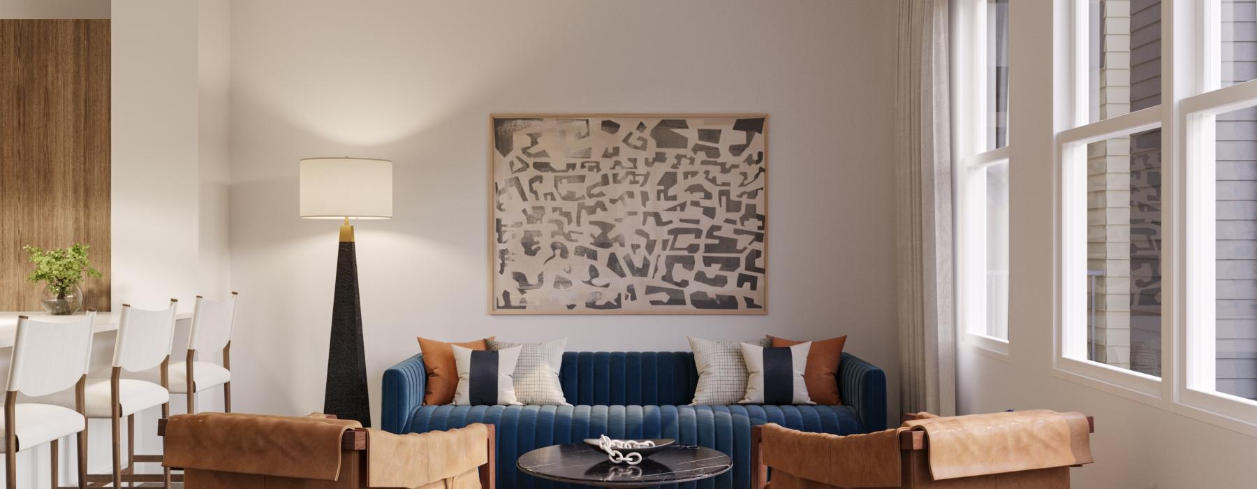 a living room with a blue couch and chairs