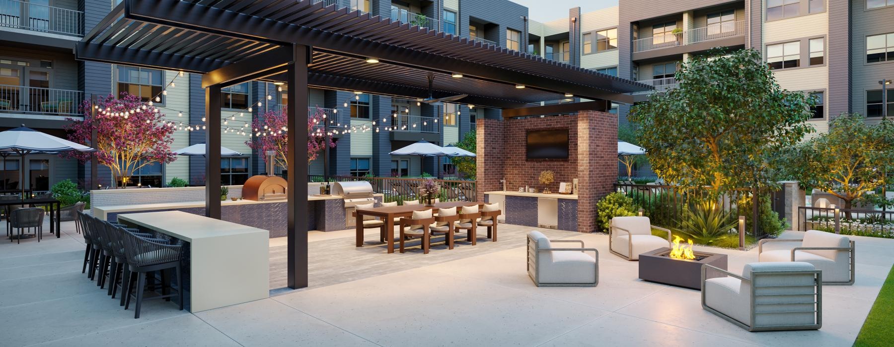 a courtyard with tables and chairs and umbrellas and buildings in the background