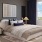 a bedroom with a large window
